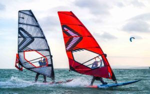 Two windsurfers planning across the wind in the UK on Severne Kit